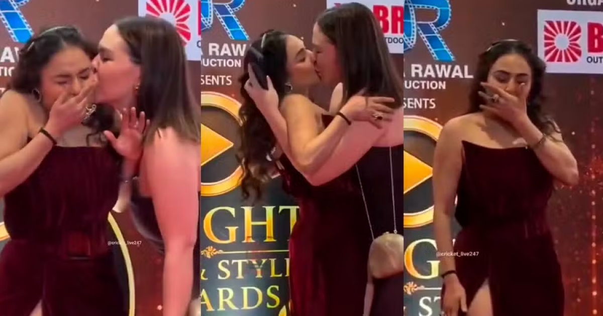 video:-atriz-indiana-nikita-rawal-e-beijada-a-forca-por-fa-ao-tirar-foto-em-evento
