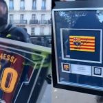 objetos-ligados-a-messi-aparecem-nas-maos-de-encapuzados-durante-protestos-em-paris;-assista